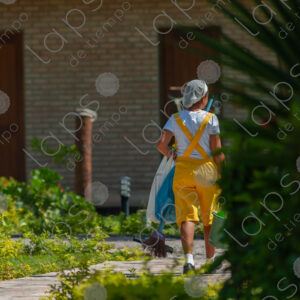 Cleaning worker walking in a resort
