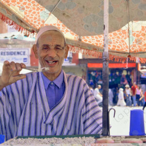 Tooth Vendor in Islamic Attire Portrait, Jemaa el-Fna Square Marrakech